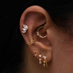 three different types of ear piercings