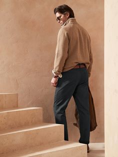 The same supreme comfort and ease of movement as our Traveler Jeans - now a jean-style chino made with high-recovery Italian stretch cotton.  Zip fly closure.  Traditional five-pocket styling.  Produced in a facility that runs P. A. C. E.  – Gap In Travel Pants, Slim Leg, Slim Legs, Jeans Style, Stretch Cotton, Banana Republic, Mid Rise, Gap, Slim Fit