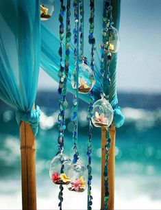 an ocean scene with beads hanging from the ceiling