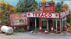 an oil painting of a gas station