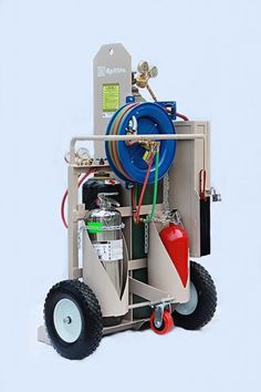 an image of a small machine that is on wheels with hoses and fire extinguisher