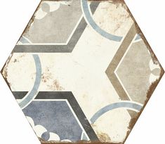 an old hexagonal tile pattern with blue, gray and white circles on it