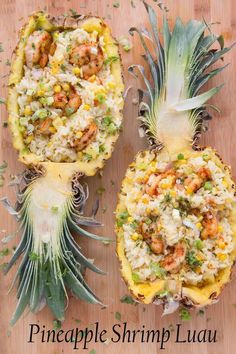 pineapple shrimp and rice salad in the middle of two pineapple halves on a cutting board