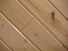 wood paneling with nails on the top and bottom