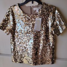 Nwt Michael Kors Gold Sequin Top Blouse Fully Lined Zippered Back Size Xxs Will Leave You Speechless!!! This Top Measures 20.5 Inches Long. The Back Has A Claw Clasp And The Zipper Comes Halfway Down. *Bundles Welcomed For A More Discounted Rate *Note: All Items Are Shipped Within 24 Hours. *Please Note Any Service Delays In Shipping Are Due To Usps And Not That Of The Shipper Festive Fitted Short Sleeve Tops, Fitted Short Sleeve Festive Tops, Fitted Short Sleeve Tops For Festive Occasions, Gold Formal Tops For Party Season, Gold Tops For Formal Party Season, Festive Fitted Spring Tops, Fitted Gold Top For Holidays, Elegant Short Sleeve Holiday Tops, Glamorous Gold Short Sleeve Top