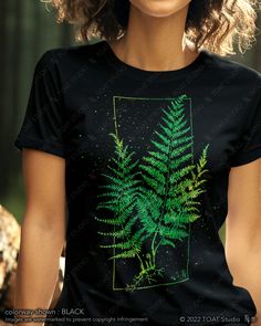 This fern leaf t-shirt is perfect for the fern lover to wear at a social gathering, on a hike, or even just as an everyday outfit. It is a great gift for anyone who spends their time enjoying nature's outdoor activities, plant nurseries, and botanical gardens. With a timeless inspired original design, this graphic tee will remain stylish for countless years to come. Love the design? Check it out in our other product offerings! AS A SWEATSHIRT : https://toatstudio.etsy.com/listing/1346041276 AS A Botanical Green Tops With Plant Print, Green Botanical Print Tops, Botanical Graphic Print Green Tops, Green Botanical Graphic Print Tops, Botanical Style Green T-shirt With Graphic Print, Green Botanical T-shirt With Graphic Print, Botanical Green T-shirt With Graphic Print, Green Nature-inspired Crew Neck T-shirt, Fern Leaf Drawing