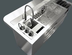 a stainless steel kitchen sink with faucet and dishwasher in the center