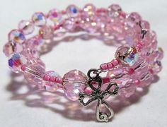 Rosary bracelet pink faceted crystal beads  on memory wire Pink Celestial, Celestial Crystal, Decade Rosary, Rosary Bracelet, Miraculous Medal, Memory Wire, Pink Bracelet, Deep Colors, Faceted Crystal