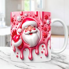 a coffee mug with santa clause on it sitting on top of a marble countertop