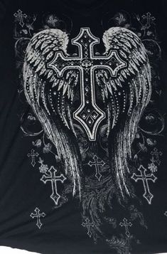 a black t - shirt with an angel cross on it