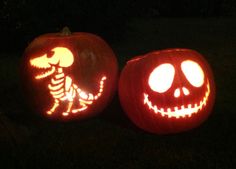 two pumpkins with carved faces and skeletons on them