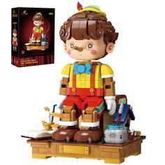 a toy figurine sitting on top of a wooden table next to a box