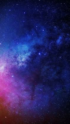 the night sky is filled with stars and bright pink, blue, and purple hues