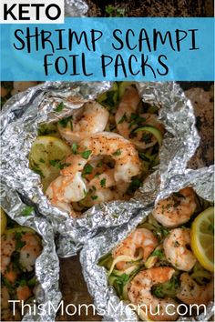 shrimp scampp foil packets with lemon wedges and parsley on the side