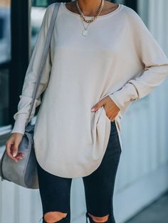 Our down sweater is oversized collared down Knit top in light beige tone is detailed with front short and long back design! Size Guide: Model is 5’6” tall, and has a 33.5” bust, 24.8”waist, & 37.4” hips. She is wearing a S / US 4 / AU 8. This knit top is true to size. Material: 65% viscose, 35% polyamide. Key Features: Relaxed fit. Oversized collar. Relax fit. Maternity friendly. Care Instructions: Machine wash / Cold hand wash Cool Girl Style, Selling Clothes, Knit Tunic, Daily Dress, Beige Sweater, Tunic Length, Tunic Sweater, Girl Style, Leather Leggings