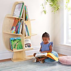 Guidecraft's EdQ collection satisfies practical storage and organizational needs in classrooms, homeschool environments and kids' play areas. The versatile, attractive furniture pieces in this complete collection provide opportunities for various easy configurations in any spaces where children learn and play. The EdQ Reading Tree is a unique bookshelf that adds a cozy element of natural inspiration to any reading area or nook. This playful storage solution features six shelves designed to store Plywood Bookshelf, Classroom Shelves, Unique Bookshelf, Standing Bookshelf, Tree Bookcase, Unique Bookshelves, Reading Tree, Kids Bookshelf, Playroom Classroom