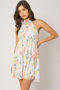 Floral print halter dress Printed Sundress For Day Out, Spring Vacation Printed Midi Dress, Multicolor Printed Sleeveless Dress For Spring, Spring Multicolor Printed Sleeveless Dress, Summer Sleeveless Dress With Prints For Garden Party, Summer Sleeveless Printed Dress For Garden Party, Multicolor Printed Sundress For Spring, Sleeveless Multicolor Midi Dress With Tropical Print, Sleeveless Multicolor Tropical Print Midi Dress