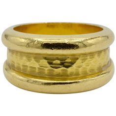 This substantial 18k gold ring has a beautiful hammered textured band in the middle creating an artistic and timeless look. Tapered in the back the ring blends together. The ring is a size 7 and can be sized to fit your finger. Art Deco Wedding Rings, Hammered Band, Eternity Band Ring, 18k Gold Ring, Gold Band Ring, Diamond Star, Wide Band Rings, Diamond Rings Bands, The Ring