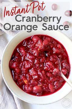 cranberry orange sauce in a white bowl with a spoon on the side and text overlay that reads instant pot cranberry orange sauce