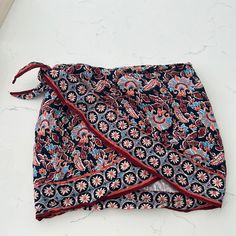 Never Worn, Great Condition. Casual Patterned Skirt, Chic Floral Print Skort For Beach, Chic Floral Print Beach Skort, Red Casual Wrap Skirt For Summer, Casual Red Wrap Skirt For Summer, Casual Cotton Wrap Skirt, Casual Fitted Floral Print Wrap Skirt, Casual Multicolor Wrap Skirt For Beach, Casual Blue Wrap Skirt For Beach