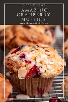 cranberry muffins on a cooling rack with cherries