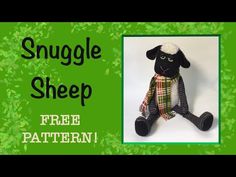 a stuffed sheep with a scarf around it's neck and the words smugle sheep free pattern