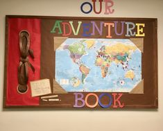 a bulletin board with the words our adventure book written on it