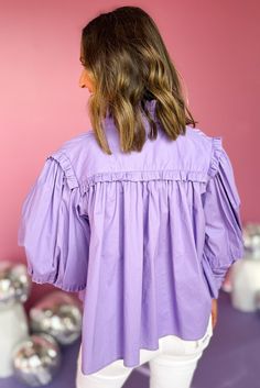 You'll be inspired every time you wear the Karlie Purple Poplin Tie Neck Ruffle Sleeve Top. Crafted from high-quality poplin fabric, this top features a tie neck, ruffled sleeves, and a fit that is both elegant and flattering. Pair this top with your go-to denim and booties for an effortless ensemble! 97% Cotton, 3% Spandex Model is 5’9, size 6 wearing a Small 4-6 Small 8-10 Medium 10-12 Large View the Size Chart Cotton Blouse With Ruffled Collar For Spring, Spring Cotton Blouse With Ruffled Collar, Spring Cotton Blouse With Ruffle Sleeves, Spring Collared Tops With Gathered Sleeves, Cotton Ruffles Blouse For Brunch, Trendy Cotton Tops With Smocked Cuffs, Cotton Ruffle Blouse For Brunch, Workwear Blouse With Ruffles And Balloon Sleeves, Trendy Workwear Blouse With Ruffle Hem