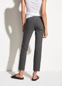 Cut from Italian ponte that's precisely paneled to flatter and free of embellishment for a streamlining effect. Elegant Fitted Pants With Split Hem, Elegant Pants With Side Slits And Split Hem, Fitted Full Length Bottoms With Elastic Side Panels, Fitted Bottoms With Elastic Side Panels, Ankle-length, Fitted Bottoms With Seam Detailing For Spring, Elegant Bottoms With Side Slits And Stretch, Fitted Ankle-length Bottoms With Elastic Side Panels, Elegant Stretch Bottoms With Side Slits, Fitted Bottoms With Split Design And Hem