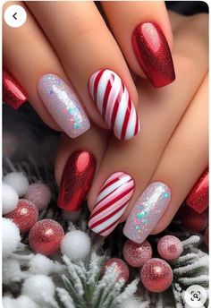 December Nails Red And White, Red Candy Cane Christmas Nails, Sparkly Candy Cane Nails, Winter Nails Candy Cane, French Candy Cane Nails, Holiday Nails Coffin Christmas, Candy Cane Snowflake Nails, Red Christmas Present Nails, Gnome Christmas Nails Art