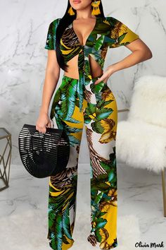 Olivia Mark - Blue Floral Print Bandage Patchwork V-Neck Short Sleeve Two-Piece Outfit for Women Multicolor Tropical Print V-neck Jumpsuits And Rompers, Green Tropical V-neck Jumpsuits And Rompers, Green Stretch Jumpsuit For Vacation, Green Stretch Jumpsuits And Rompers For Vacation, Tropical Printed V-neck Jumpsuits And Rompers, Green V-neck Tropical Print Jumpsuits And Rompers, Green V-neck Tropical Print Jumpsuit, Green V-neck Jumpsuit For Beach Season, Printed Tropical V-neck Jumpsuits And Rompers