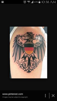 a tattoo with an eagle and german flag on it