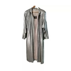 Indulge In The Glamour Of The 80s With This Stunning Vintage Silver Overcoat For Women Paris By A.Kazan. The Coat Features A Unique Crocodile Pattern And Shoulder Pads. The Dolman Sleeves Give A Stylish And Comfortable Fit. This Original Piece Is Perfect For Those Who Love Vintage Fashion. Light Pink Lining. Approx. Measurements Include 51 Inches Shoulder To Hem 28 Inches Armpit To Armpit 24 Shoulder To Shoulder Overcoat Woman, Overcoat For Women, Women Overcoat, Crocodile Pattern, Love Vintage, 80s Vintage, Kazan, The 80s, Dolman Sleeve