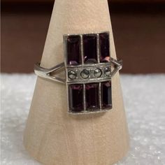 Gorgeous Art Deco Sterling Silver Ring With Amethyst Baguettes And Marcasite, Size 8 Very Nice Gently Used Condition Has A Makers Mark That Looks Like Two Triangles With An Ampersand (&) In Between Silver Sterling Silver Rings For Evening, Sterling Silver Rings For Evening, Silver Art Deco Rings For Evening, Silver Multi-stone Jewelry For Evening, Silver Hallmarked Rings For Evening, Formal Silver Amethyst Ring, Silver Art Deco Amethyst Ring For Formal Occasions, Silver Gemstone Rings For Evening, Gorgeous Art