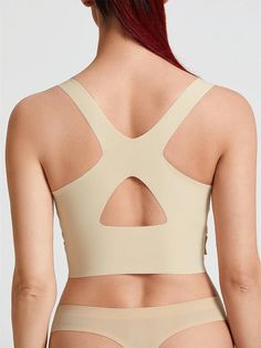 Beige Stretch Sports Bra With Built-in Bra, Beige Compression Seamless Activewear, Beige Seamless Compression Activewear, Beige Seamless Push-up Shapewear, Beige Stretch Sports Bra, High Stretch Seamless Beige Activewear, Beige Seamless High Stretch Activewear, Beige Stretch Shapewear Bra, Beige Seamless Sports Bra