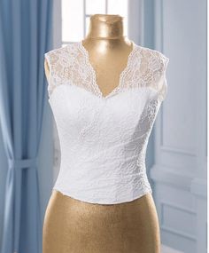 a mannequin with a white top on it