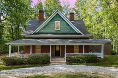 a small brick house in the woods