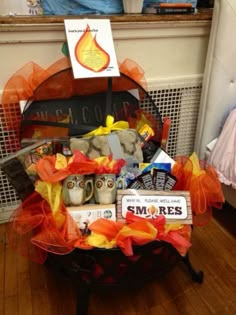 a basket filled with items sitting on top of a wooden floor