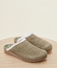 Shearling-Lined Moc Clog Laurel Our take on the classic shearling clogs. As luxuriously cozy as slippers, but made to be worn anywhere. We know that comfort is key—with a cork sole that molds to your feet, you'll never want to take these off. Suede with shearling lining. Handmade in Italy. Shearling Clogs, Black Slippers, Jenni Kayne, Leather Clogs, Mule Clogs, Mules Shoes, Leather Slip Ons, Slide Slipper, Flat Shoes Women