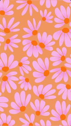 a pink and orange flower pattern on a green background