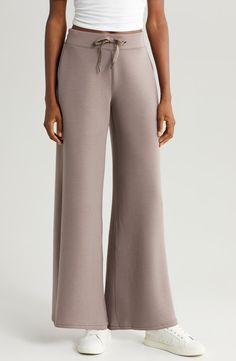 SPANX® AirEssentials Wide Leg Pants | Nordstrom Compressive Full-length Bottoms For Spring, Compressive Wide Leg Athleisure Pants, Compressive Wide Leg Athleisure Bottoms, Compressive Elastic Waistband Pants For Loungewear, Versatile Compressive Bottoms For Loungewear, Compressive Loungewear Pants With Elastic Waistband, Pants Nordstrom, Drawstring Waist, Leg Pants