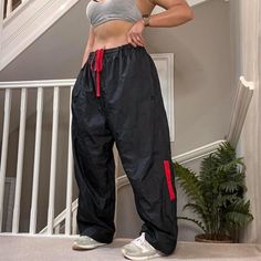 Vintage Starter straight wide leg oversized fit windbreaker track pants 🍂 Tag says Size 3XL and can be unisex  32" inner leg Seen on size 10uk, 5'4" for reference overall Good condition joggers sportswear trackie track-pant tracksuit bottom sweatpants casual streetwear baggy pants parachute pants y2k 00s gymwear activewear unisex  64 90s Style Baggy Black Pants, 90s Style Black Baggy Pants, Black Hip Hop Parachute Pants With Relaxed Fit, Black Relaxed Fit Hip Hop Parachute Pants, Oversized Black Parachute Pants For Streetwear, Oversized Black Wide Leg Parachute Pants, Oversized Wide Leg Black Parachute Pants, Black Baggy Parachute Pants For Sports, Oversized Black Parachute Pants Casual Style