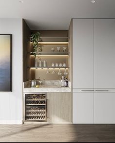 a wine rack in the corner of a room with white cabinets and glassware on it