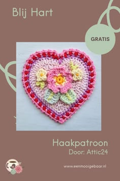 a crocheted heart with flowers on it and the words hakkaton door attic written