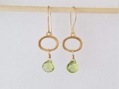 Petite and faceted Peridot earrings in sterling silver or 14k gold filled with ceramic coating on the oval piece to eliminate any possibility of tarnishing. These everyday earrings are the perfect birthday present for those born in August.  Pair with my peridot necklace to make a beautiful jewelry gift combination. Modern Oval Pendant Earrings For Gift, Oval Faceted Earrings As Gift, Oval Faceted Earrings For Gift, Yellow Gold Oval Earrings For Gifts, Yellow Gold Oval-shaped Earrings Gift, Yellow Gold Oval Pendant Earrings For Gift, Briolette Earrings, Ethiopian Opal Necklace, Peridot Earrings