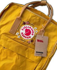 Casual Embroidered Backpack, Casual Backpack With Embroidered Logo For Daily Use, Embroidered Logo Travel Bags For Back To School, Embroidered Patch Backpack For Everyday Use, Back To School Travel Bags With Embroidered Logo, Travel Bags With Embroidered Logo For Back To School, Yellow Embroidered Travel Bag, Ochre Yellow, Floral Backpack