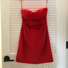 This Is The Little Red Dress That Is Perfect For That Special Night Out In Town (When Sage To Do So!) The Dress Is Form Fitting And Definitely Hits Above The Knees! Red Strapless Sweetheart Neckline Dress For Night Out, Red Strapless Dress For Spring Date Night, Red Strapless Dress For Date Night In Spring, Red Ruched Strapless Dress, Red Ruched Strapless Dress For Spring, Red Strapless Dress With Sweetheart Neckline And Ruched Details, Red Strapless Summer Cocktail Dress, Red Ruched Strapless Mini Dress, Red Ruched Strapless Dress For Night Out