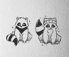 two raccoons with hats on sitting next to each other