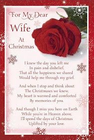 a red rose with the words for my dear wife at christmas