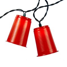 two red lamps hanging from a black cord